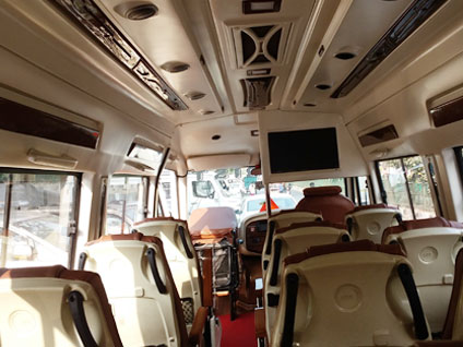 15+1 seater luxury tempo traveller with sofa cum bed